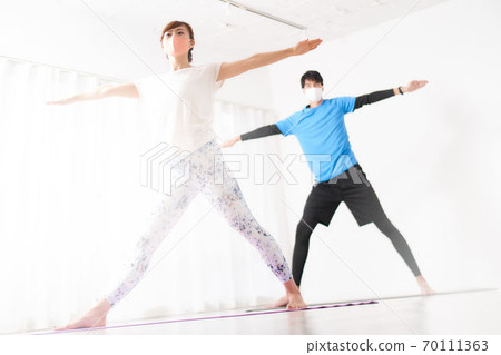Women and men exercising with masks Women and men exercising with masks 70111363