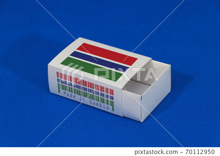Gambia flag on white box with barcode and the color of nation flag on blue background Gambia flag on white box with barcode and the color of nation flag on blue background 70112950