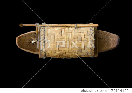Boat toy from coconut shell and bamboo die cut on black isolated Boat toy from coconut shell and bamboo die cut on black isolated 70114131