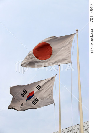 The flag of Japan and Republic of Korea on blue sky background 70114949