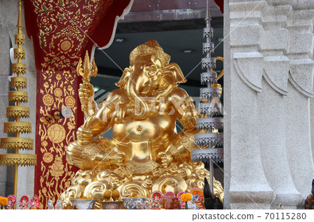 Golden Ganesha be enshrined on camber altar with silver and golden tiered Golden Ganesha be enshrined on camber altar with silver and golden tiered 70115280