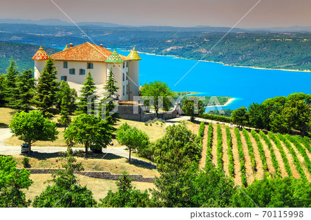 Aiguines castle with St Croix lake in background, Provence, France, Europe 70115998