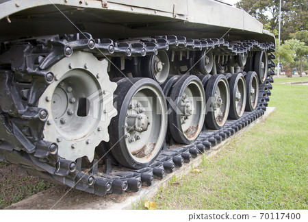 quad tracked tank on the green lawn. Can be driven in all terrain. quad tracked tank on the green lawn. Can be driven in all terrain. 70117400