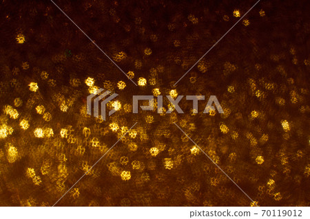 Christmas background. Festive abstract background with bokeh defocused lights and stars Christmas background. Festive abstract background with bokeh defocused lights and stars 70119012