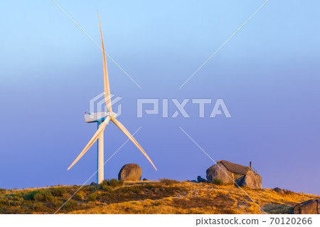 Windmill power generator and famous stone house - Guimaraes Portugal 70120266