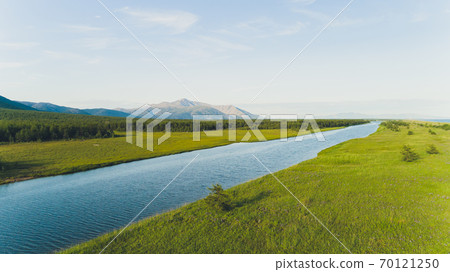 Sea bay surrounded by mountains. Peninsula Kony. The Sea of Okhotsk. Magadan Region. Russia. Sea bay surrounded by mountains. Peninsula Kony. The Sea of Okhotsk. Magadan Region. Russia. 70121250