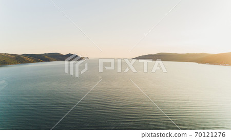 Sea bay surrounded by mountains. Peninsula Kony. The Sea of Okhotsk. Magadan Region. Russia. Sea bay surrounded by mountains. Peninsula Kony. The Sea of Okhotsk. Magadan Region. Russia. 70121276