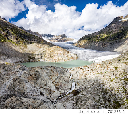The Rhone Glacier, the source of the Rhone at Furka Pass in Switzerland The Rhone Glacier, the source of the Rhone at Furka Pass in Switzerland 70122841