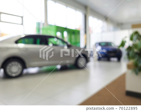 Blurred car dealership background 70122895