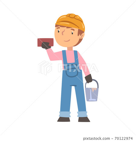 Boy Construction Worker with Bucket and Brick, Cute Little Builder Character Wearing Blue Overalls and Hard Hat with Professional Tools Cartoon Style Vector Illustration 70122974