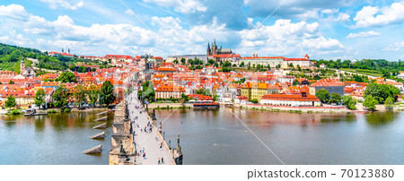 Prague panorama with Prague Castle, and Charles Bridge over Vltava River. View from Old Town Bridge Tower, Czech Republic 70123880