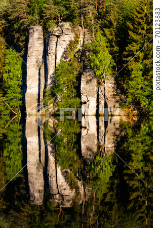 Sandstone rock towers reflected in Vezak Pond, Czech: Vezicky rybnik, Bohemian Paradise, Czech: Cesky Raj, Czech Republic Sandstone rock towers reflected in Vezak Pond, Czech: Vezicky rybnik, Bohemian Paradise, Czech: Cesky Raj, Czech Republic 70123883