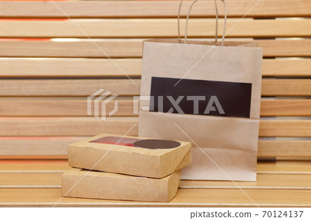 Food boxes with sushi and rolls 70124137