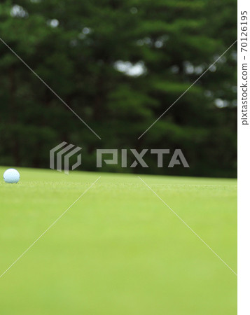 Golf ball image bokeh on green Golf ball image bokeh on green 70126195