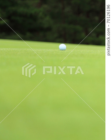 Golf ball image bokeh on green Golf ball image bokeh on green 70126196