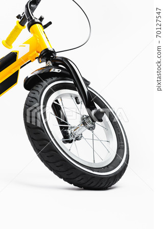 part of kids bicycle wheel with spokes, white background 70127547