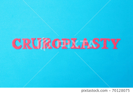 The word cruroplasty in red letters on a blue background. The concept of the procedure in plastic surgery for changing the correction of the shape of the leg with the help of implants 70128075
