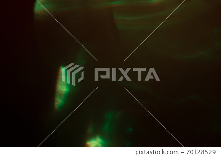 Blurred lens flare. Defocused colorful lights. Shiny glowing spots, abstract background and texture 70128529