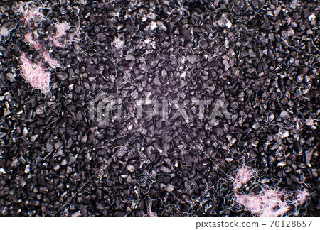 The contents of the water filter are protected against chlorine and unpleasant odors. Effective water purification from harmful impurities, post-carbon, macro photography 70128657