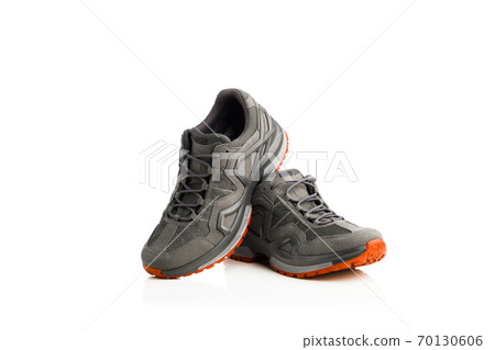 trekking sneakers with red sole, isolated on white trekking sneakers with red sole, isolated on white 70130606