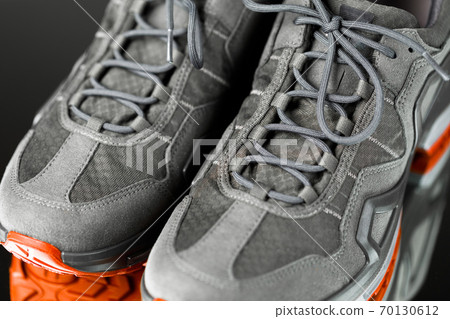 laces of trekking sneakers, close-up view laces of trekking sneakers, close-up view 70130612