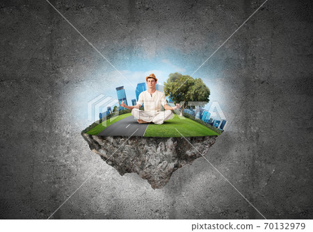 Young man keeping mind conscious. 70132979