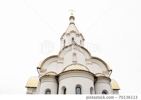 Beautiful church with a golden dome and bells against the sky, architectural, copy space, historic 70136113
