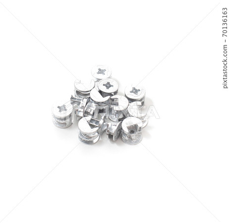 eccentric coupler for furniture assembly on a white background, close-up, isolate eccentric coupler for furniture assembly on a white background, close-up, isolate 70136163