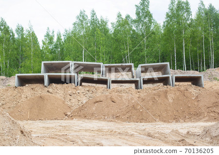 Reinforced concrete slabs for heating. Modern plates for preserving the waterproofing of the heating main, background Reinforced concrete slabs for heating. Modern plates for preserving the waterproofing of the heating main, background 70136205