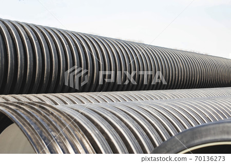 Large diameter plastic pipes for supplying heating and water supply to the house. Modern method of laying durable pipes, chemical resistance, copy space. Industry 70136273