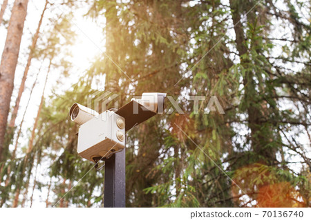 Cameras in the forest for tracking animals, background, copy space 70136740