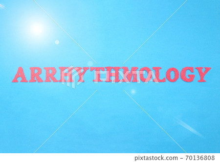 The word arrhythmology in red letters on a blue background. Section concept in cardiology dealing with the treatment of heart disease, arrhythmia, medicine 70136808