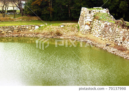 The corner of the stone wall of the moat seen from the ruins of the castle tower of Hagi Castle 70137998