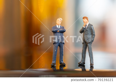 Businessman  standing and thinking with colorfull background. 70139221