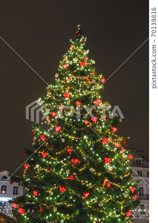 Christmas tree with decorations and lights, european Christmas market at night 70139816
