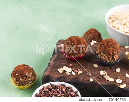 Protein energy balls with cocoa and seeds 70140763