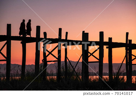 Silhouette of U Bein Bridge at sunrise near Amarapura in Myanmar former Burma Silhouette of U Bein Bridge at sunrise near Amarapura in Myanmar former Burma 70141017