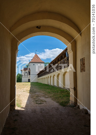 View through the arch to old ancient castle in Liubcha, Grodno region, Belarus View through the arch to old ancient castle in Liubcha, Grodno region, Belarus 70141036