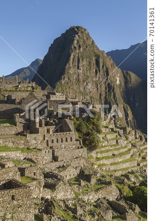 View of the sunrise over Machu Picchu and Huayna Picchu, Peru 70141361
