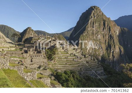 View of the sunrise over Machu Picchu and Huayna Picchu, Peru 70141362