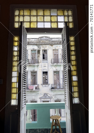 Balcony entrance with old building in background - Havana, Cuba 70141771