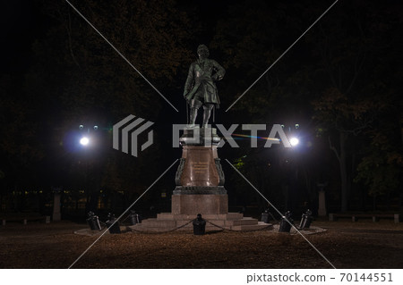 Russia. Kronshtadt. Autumn night photo of the monument to Peter the Great in Petrovsky Park. 70144551