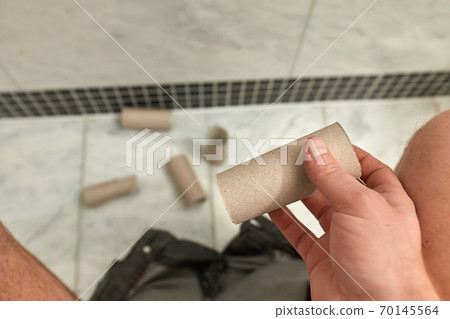 Finding empty roll in the restroom 70145564