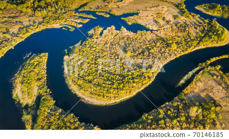 Aerial View Green Forest Woods And River Landscape In Sunny Spring Summer Day. Top View Of Beautiful European Nature From High Attitude In Autumn Season. Drone View. Bird's Eye View 70146185