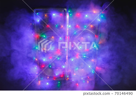 music speakers with festive Christmas lights and smoke 70146490