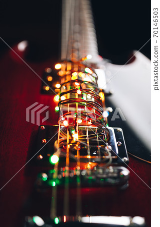 electric guitar with festive Christmas lights electric guitar with festive Christmas lights 70146503