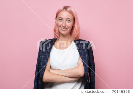 Portrait of happy young business woman smiling Portrait of happy young business woman smiling 70146598