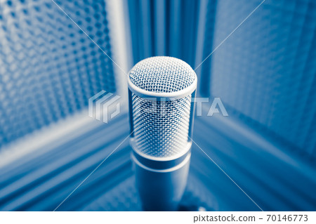 professional microphone in sound recording studio, blue acoustic foam background professional microphone in sound recording studio, blue acoustic foam background 70146773