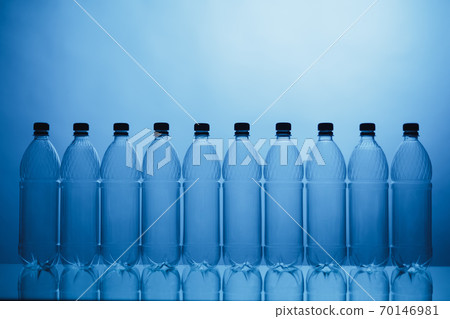 empty plastic bottle silhouettes on blue background empty plastic bottle silhouettes on blue background 70146981