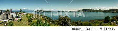Cementery at Llanguihue lake and Osorno Volcano, Puerto Varas, Chile, South America. Cementery at Llanguihue lake and Osorno Volcano, Puerto Varas, Chile, South America. 70147649